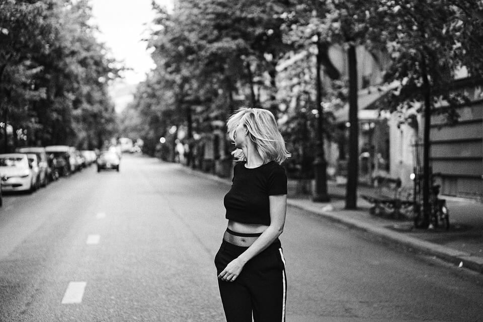black and white walking girl