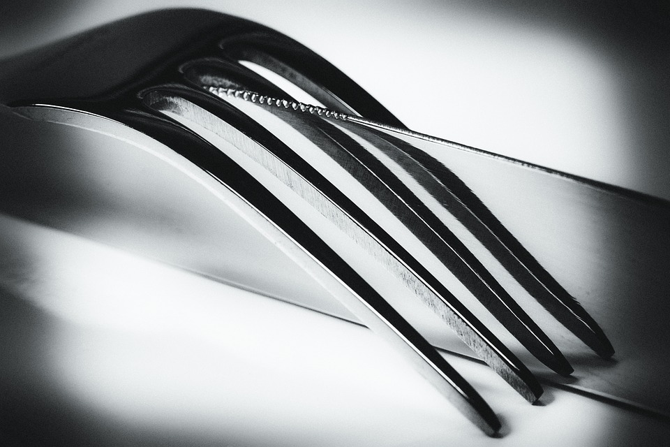 black and white knife and fork