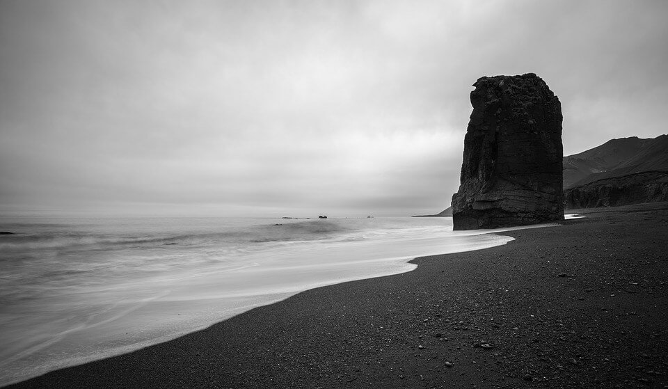 black and white sea rock