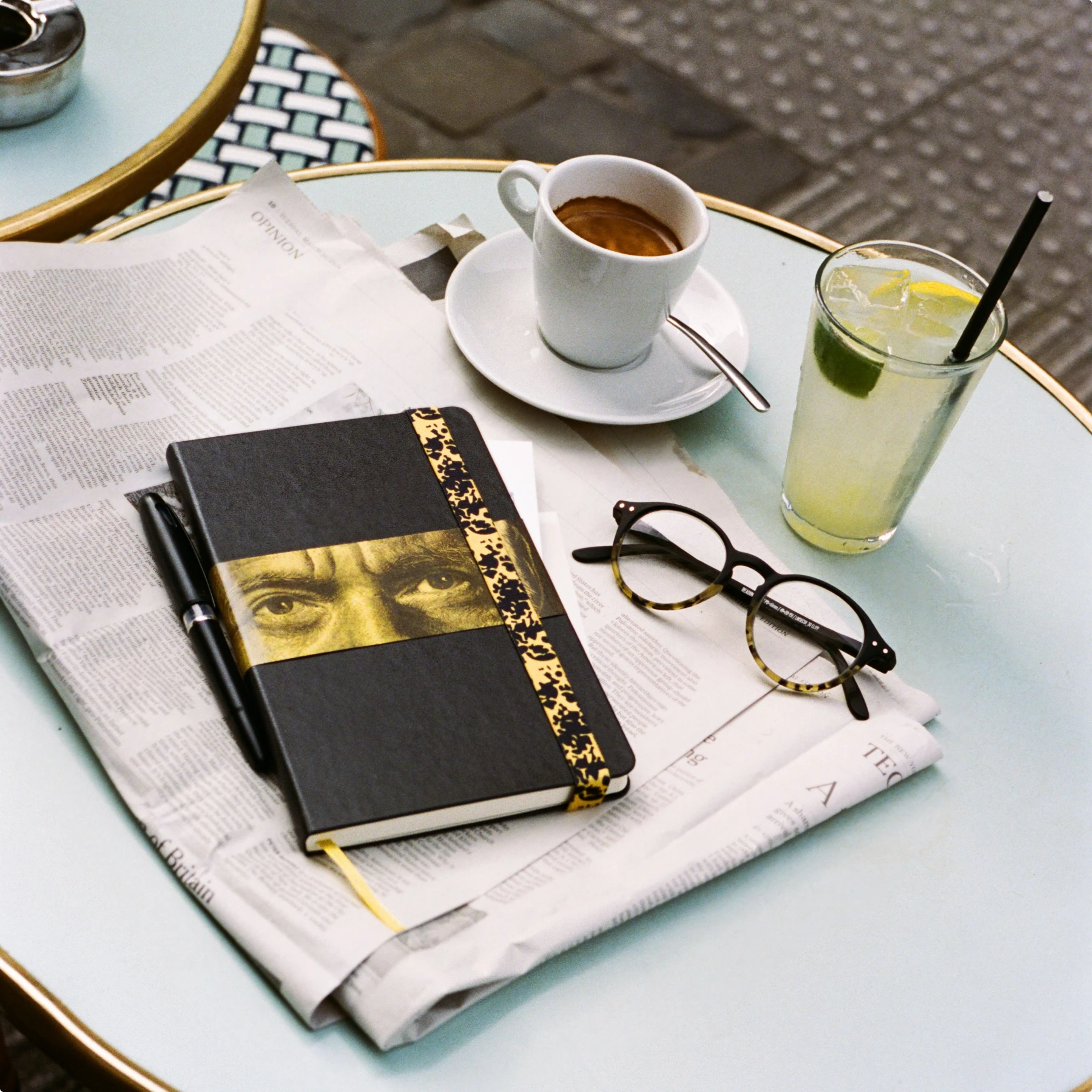 Moleskine with reading glasses